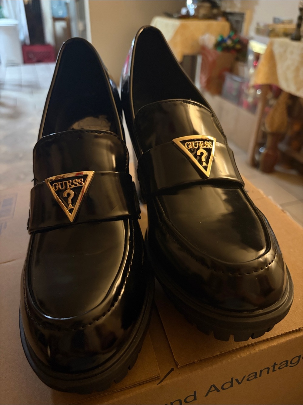 GUESS Black Patent Leather Slip-On Loafers with Gold Triangle Emblem